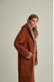 Women's long sheepskin coat of red color made of natural sheepskin