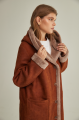 Women's long sheepskin coat of red color made of natural sheepskin