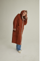 Women's long sheepskin coat of red color made of natural sheepskin