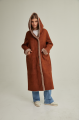 Women's long sheepskin coat of red color made of natural sheepskin