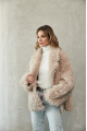 Women's double-sided sheepskin jacket of beige color made of natural sheepskin