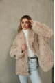 Women's double-sided sheepskin jacket of beige color made of natural sheepskin