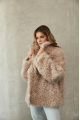 Women's double-sided sheepskin jacket of beige color made of natural sheepskin