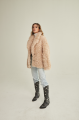 Women's two-sided sheepskin jacket made of natural sheepskin in beige color