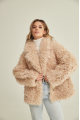 Women's two-sided sheepskin jacket made of natural sheepskin in beige color