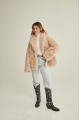 Women's two-sided sheepskin jacket made of natural sheepskin in beige color