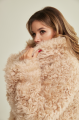 Women's two-sided sheepskin jacket made of natural sheepskin in beige color