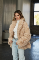 Women's two-sided sheepskin jacket made of natural sheepskin in beige color