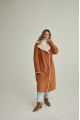 Long women's suede sheepskin coat of red color in VINTAGE style made of natural sheepskin