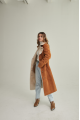 Long women's suede sheepskin coat of red color in VINTAGE style made of natural sheepskin