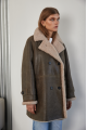 Women's sheepskin coat of gray color made of natural sheepskin in VINTAGE style