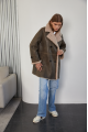 Women's sheepskin coat of gray color made of natural sheepskin in VINTAGE style