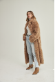 Long two-sided sheepskin coat made of natural sheepskin in camel color