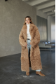 Long two-sided sheepskin coat made of natural sheepskin in camel color