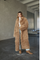 Long two-sided sheepskin coat made of natural sheepskin in camel color