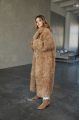 Long two-sided sheepskin coat made of natural sheepskin in camel color