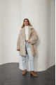 A stylish double-sided sheepskin jacket made of natural white sheepskin