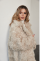 A stylish double-sided sheepskin jacket made of natural white sheepskin