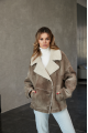 Women's sheepskin-jacket of brown color made of natural sheepskin in VINTAGE style