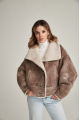 Women's short sheepskin-jacket of brown color made of natural sheepskin in VINTAGE style