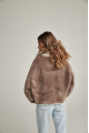 Women's short sheepskin-jacket of brown color made of natural sheepskin in VINTAGE style