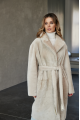 Long two-sided sheepskin coat made of natural sheepskin in beige color