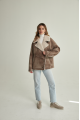 Women's sheepskin-jacket of brown color made of natural sheepskin in VINTAGE style