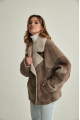 Women's sheepskin-jacket of brown color made of natural sheepskin in VINTAGE style