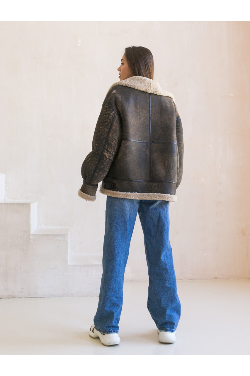 Stylish women's sheepskin coat made of natural sheepskin in VINTAGE style