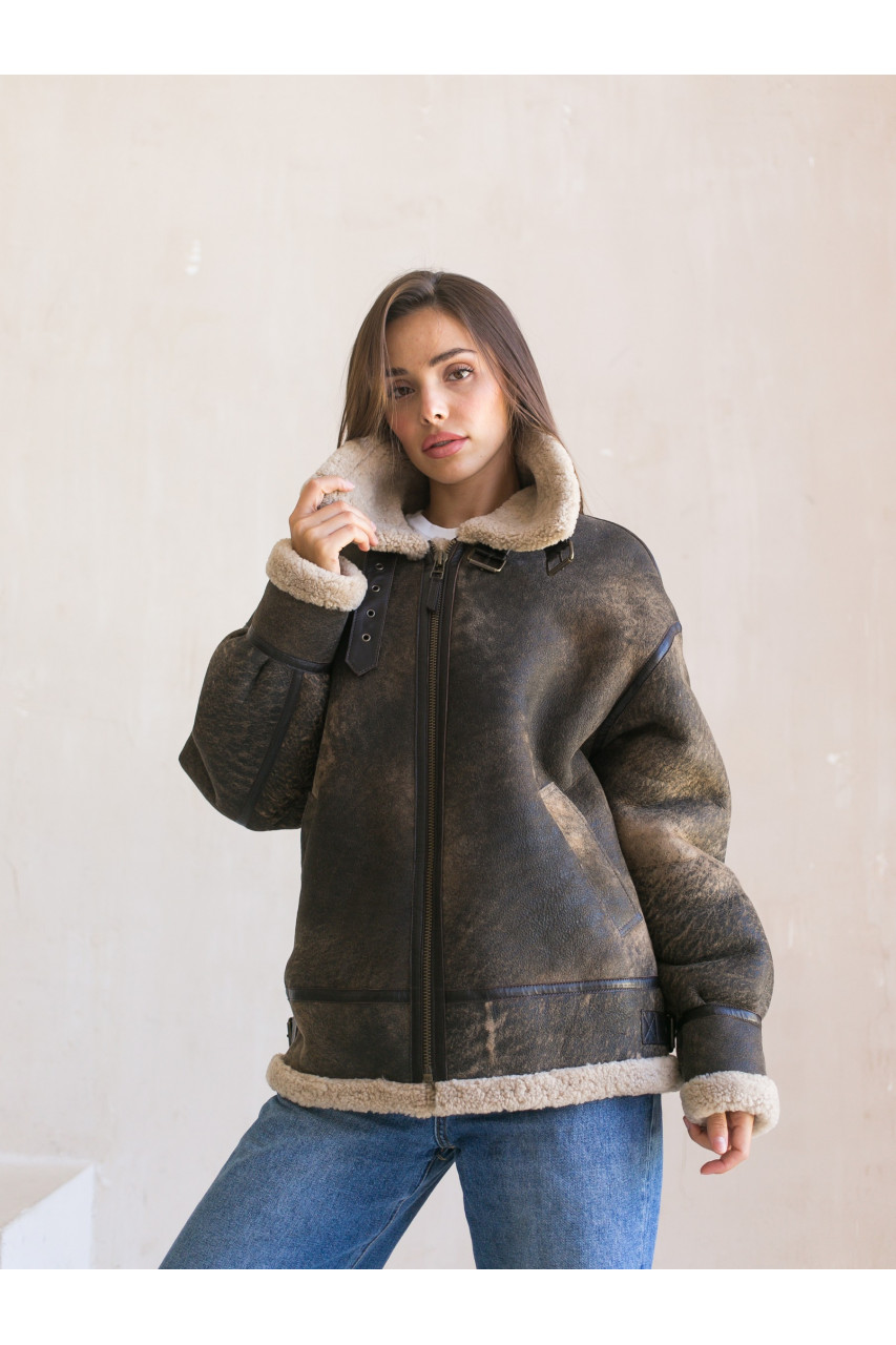 Stylish women's sheepskin coat made of natural sheepskin in VINTAGE style