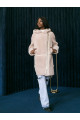 Women's sheepskin coat made of cream-colored natural sheepskin wool