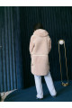 Women's sheepskin coat made of cream-colored natural sheepskin wool
