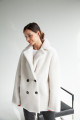 Women's double-sided sheepskin jacket made of brown natural sheepskin with milky fur