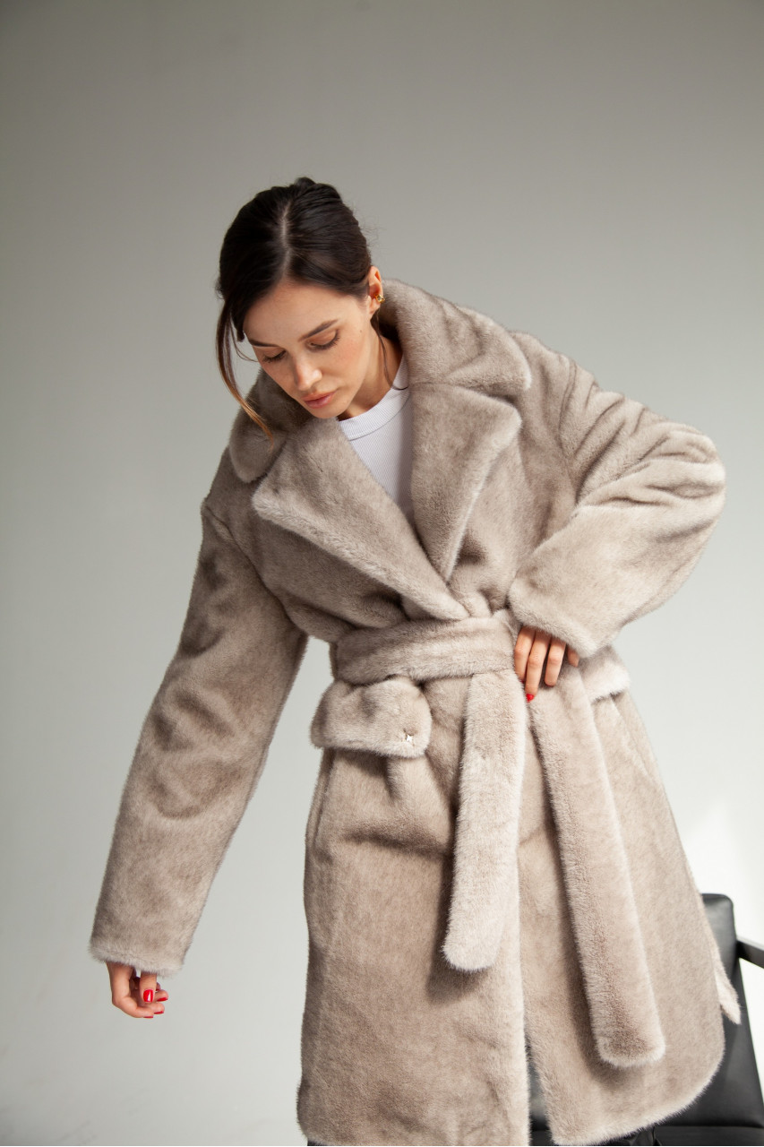 Women's coat of gray color made of ECO fur