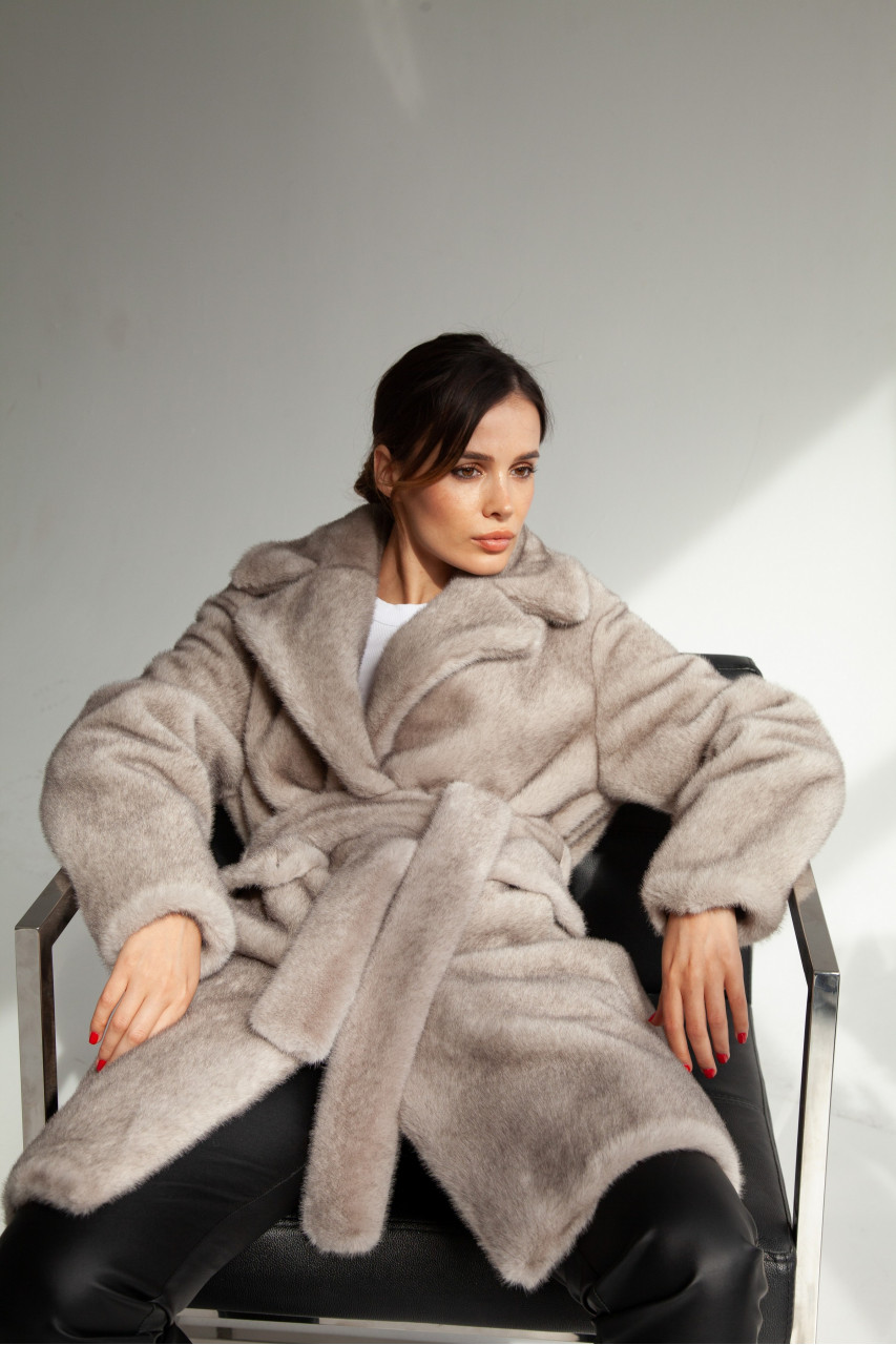 Women's coat of gray color made of ECO fur