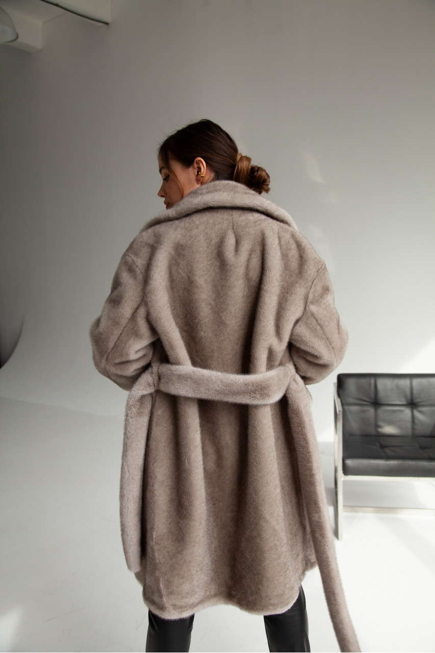 Women's coat of gray color made of ECO fur