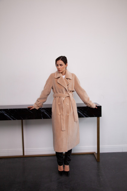 A sheepskin coat made of peach-colored wool