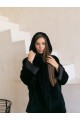 Two-sided sheepskin coat of dark blue color with a hood