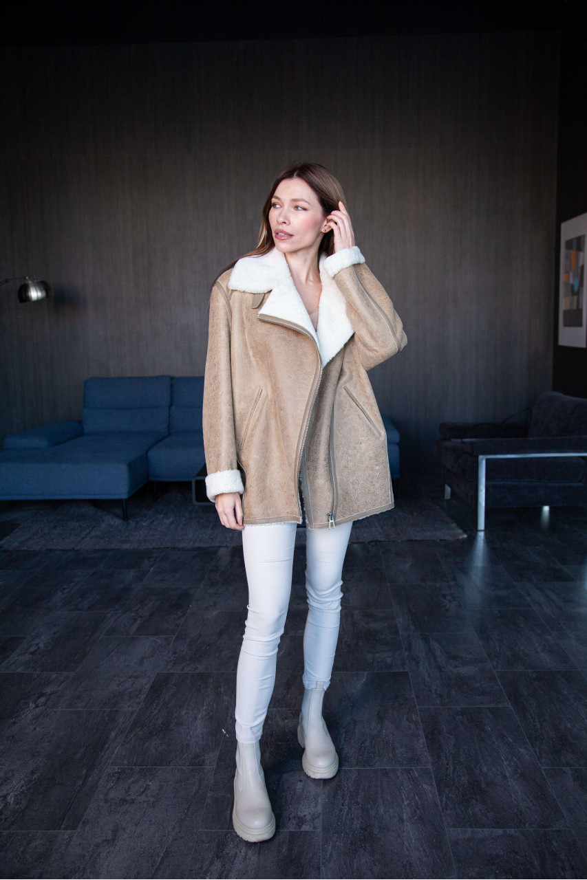 Women's beige sheepskin coat in VINTAGE style made of natural sheepskin