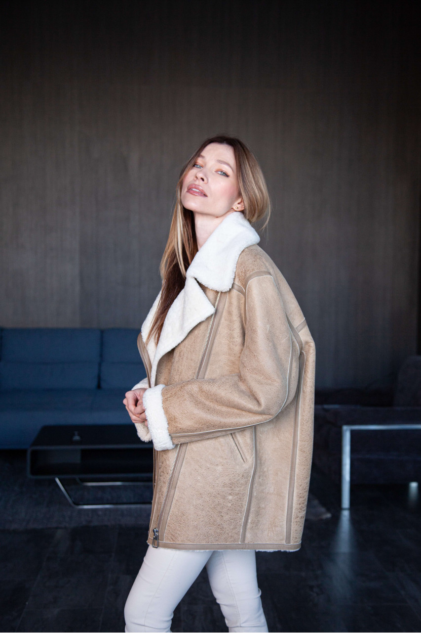Women's beige sheepskin coat in VINTAGE style made of natural sheepskin