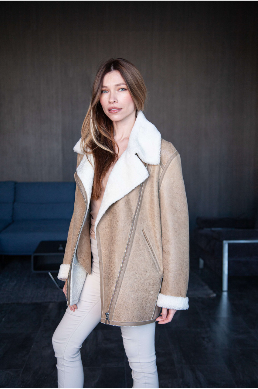 Women's beige sheepskin coat in VINTAGE style made of natural sheepskin