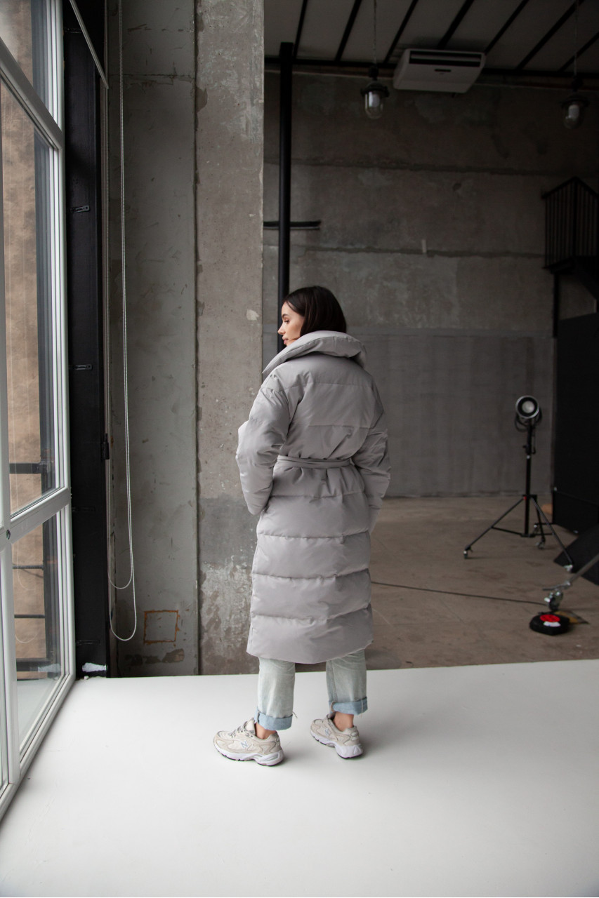 Women's long down jacket in mint color with natural filler