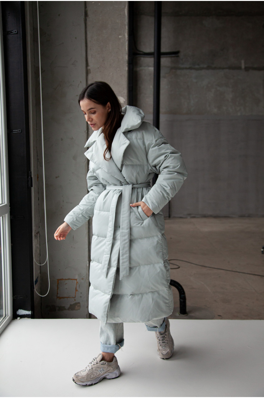 Women's long down jacket in mint color with natural filler