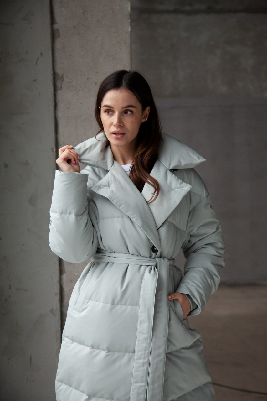 Women's long down jacket in mint color with natural filler