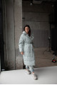 Women's long down jacket in mint color with natural filler