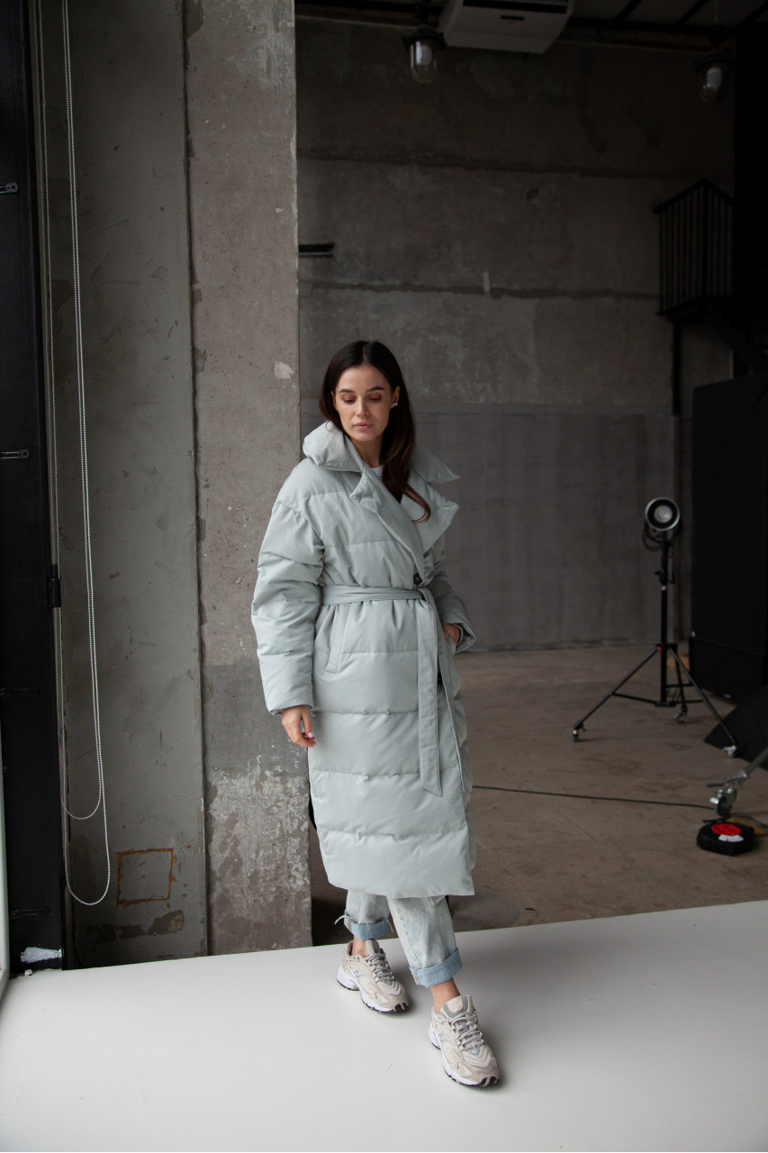 Women's long down jacket in mint color with natural filler