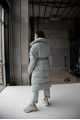 Women's long down jacket in mint color with natural filler