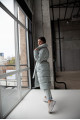 Women's long down jacket in mint color with natural filler
