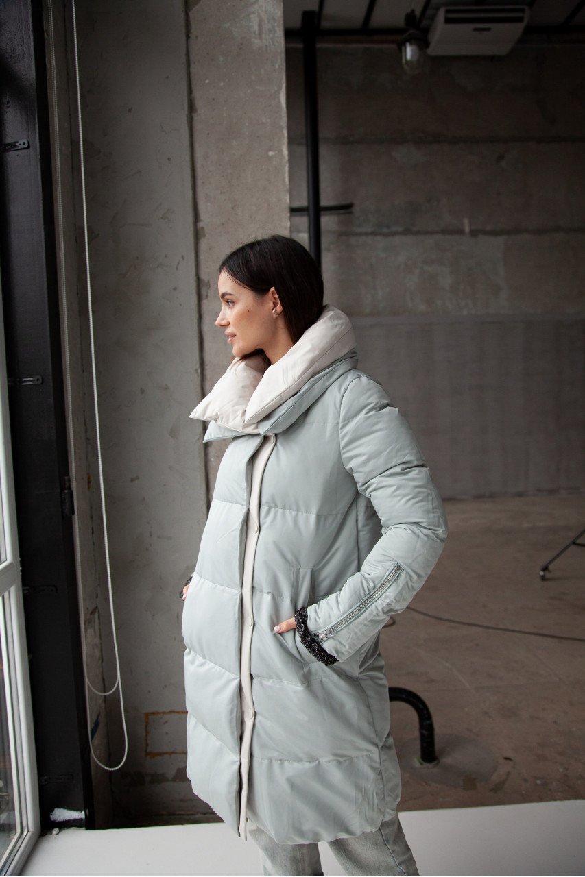 Stylish down jacket in mint color with natural filler