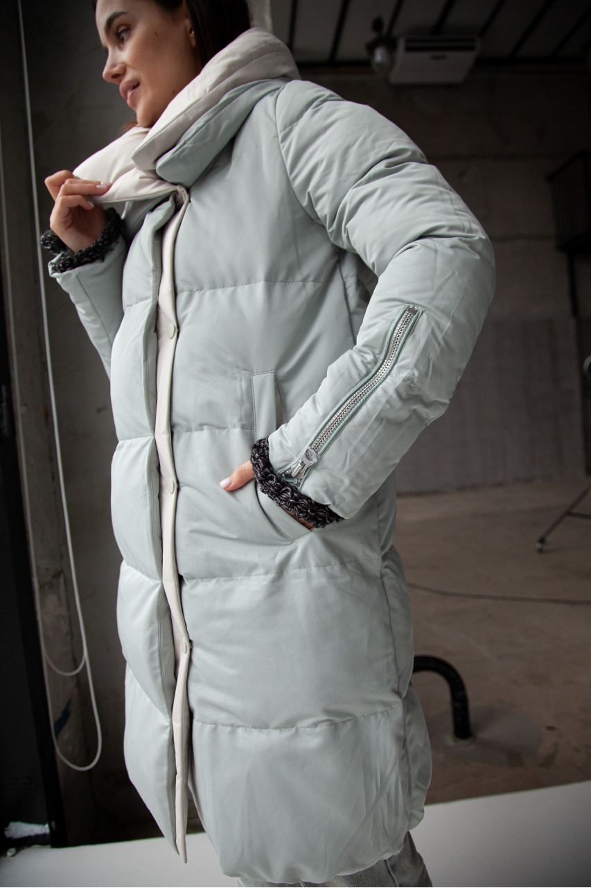 Stylish down jacket in mint color with natural filler